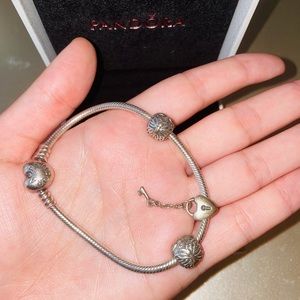 Silver Pandora bracelet with 3 charms
